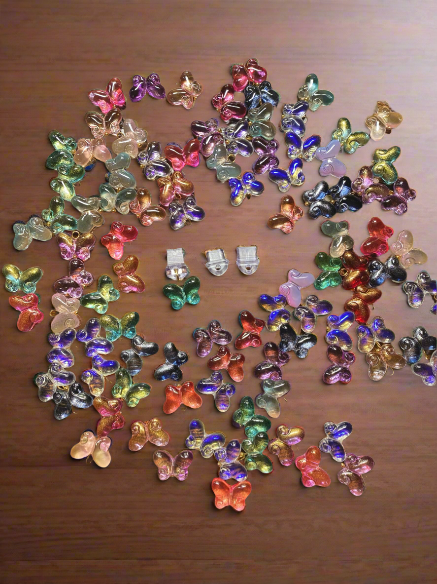 Mystery Butterfly Dust Plug Charm